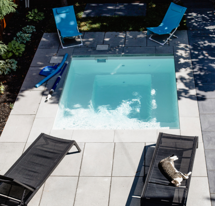  Custom pool - Custom designed swimming pool surrounded by stone plates