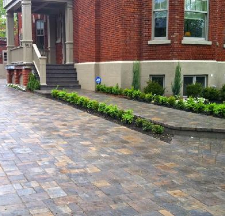 Landscape in Westmount - Paving stone driveway and planters